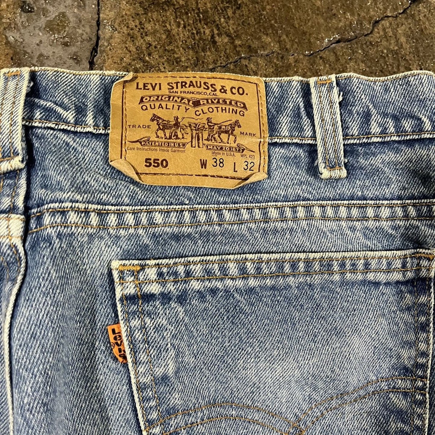 Vintage 90s Levi's 550 Faded Orange Tab Jeans (36)